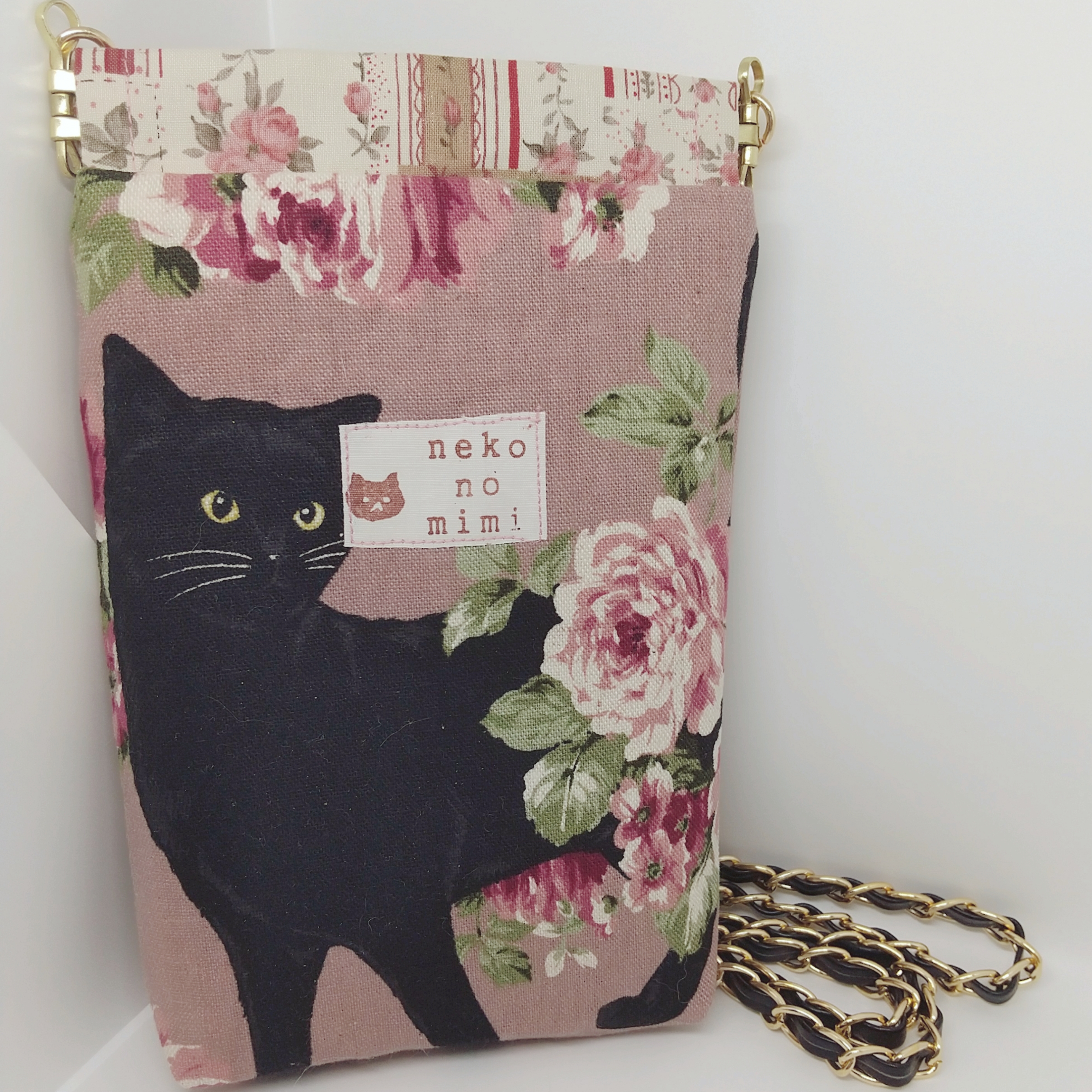 雑貨 服飾雑貨 バネ口スマホポシェット 黒猫とピンクローズ とやまーと 北日本新聞サービスセンターのオンライン商店街 雑貨 服飾雑貨 バネ口スマホポシェット 黒猫とピンクローズ とやまーと 北日本新聞サービスセンターのオンライン商店街